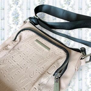 Steve Madden women's M pink Crossbody bag several zippers adjustable black strap